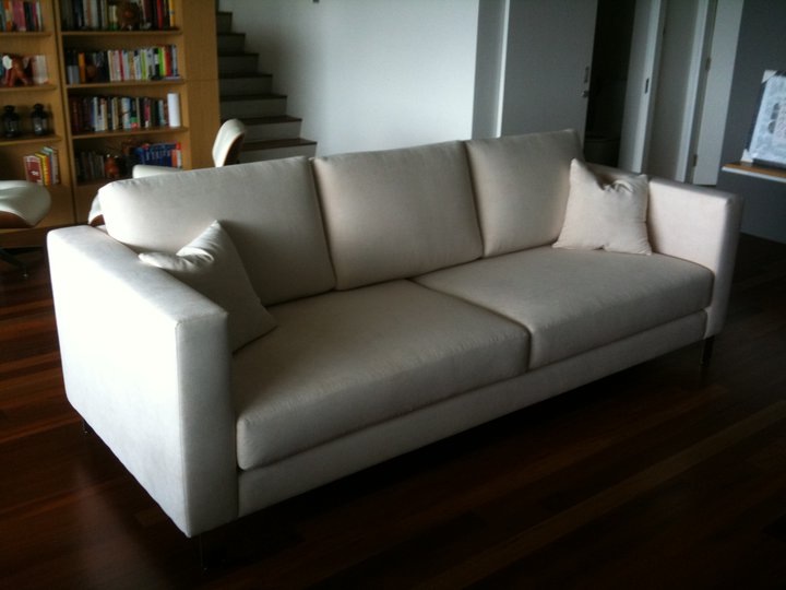 Tailored ivory sofa in a Singapore home